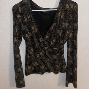 Black and gold floral top with a V neck